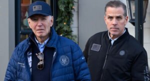 A-November-29-2024-photo-shows-US-President-Joe-Biden-and-son-Hunter-Biden-stepping-out-of-a-bookst