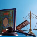 sharia law concept , gavel hammer libra scale and holly koran